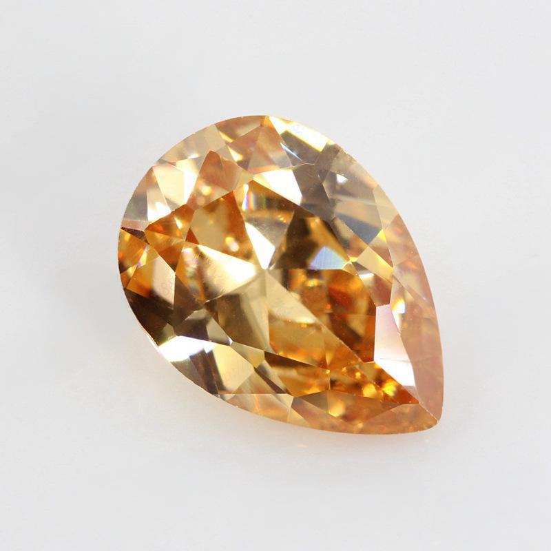 梨形香槟色锆石戒面 水滴形人工CZ裸石 人造尖底钻梧州