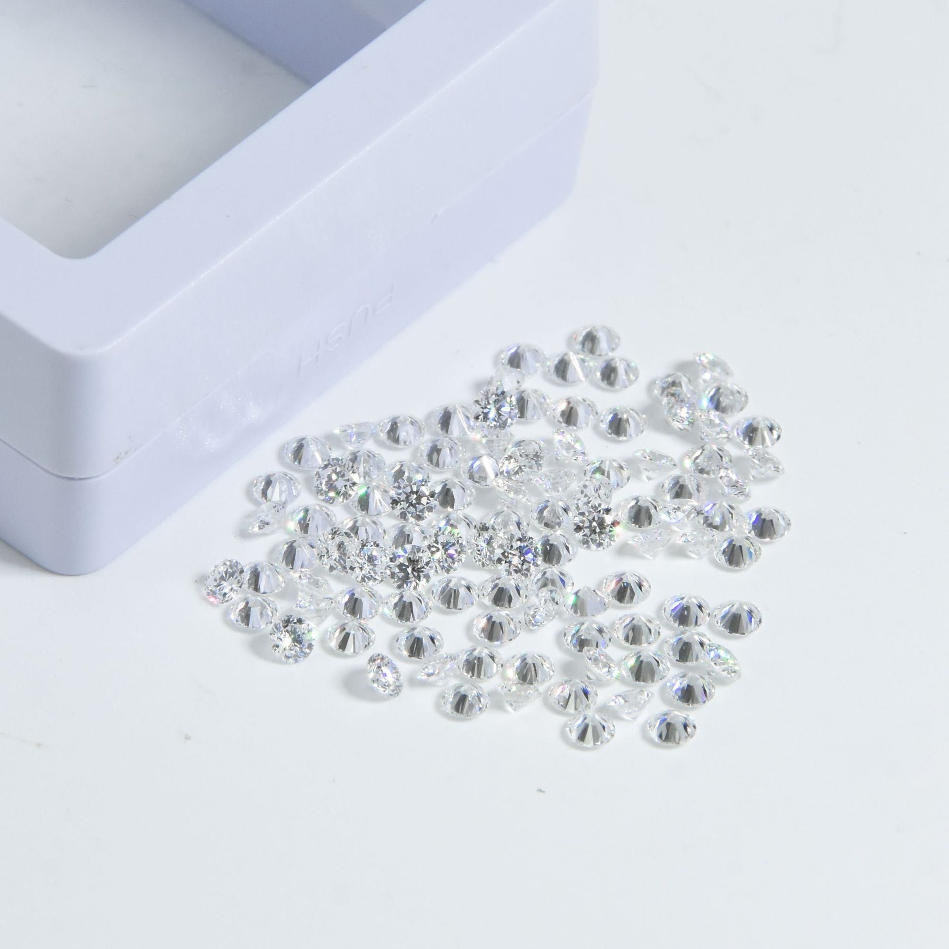 EF色莫桑石八心八箭梧州宝石厘石0.7~3mm小圆形首饰首饰裸配石